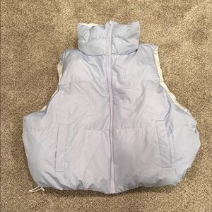 Reversible puffer vest. Periwinkle and white size xl